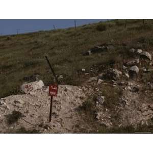 Sign Warns of Mines in the Hills Surrounding the Dead Sea Stretched 