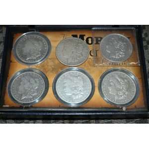  6 silver morgan Dollars 2 of which are 1921 dates 