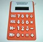   Cable Rubber Rollable Calculator Raised Numbers Orange Advertisement