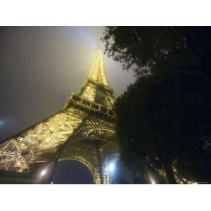  Close up of Eiffel Tower Illuminated at Night, Paris 
