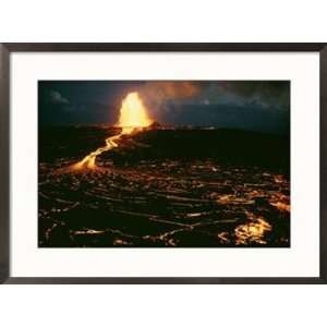 blazing fountain and a river of lava pour from a vent of the volcano 