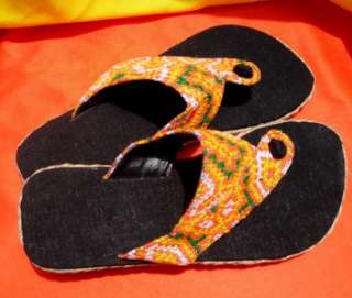 Fabric uppers are made of re purposed Hmong embroidered fabric.