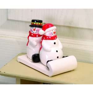   Christmas salt and pepper snowman riding a sled 5