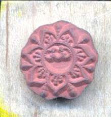   is a wood mounted stamp from embossing arts this stamp shows a sun