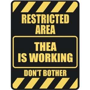   RESTRICTED AREA THEA IS WORKING  PARKING SIGN