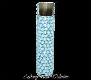 This exquisite cigarette lighter case is covered with Swarovski 