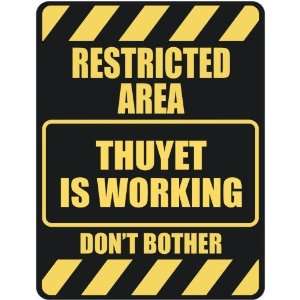   RESTRICTED AREA THUYET IS WORKING  PARKING SIGN