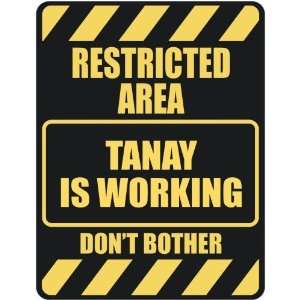   RESTRICTED AREA TANAY IS WORKING  PARKING SIGN