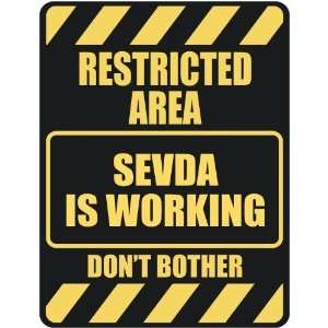   RESTRICTED AREA SEVDA IS WORKING  PARKING SIGN