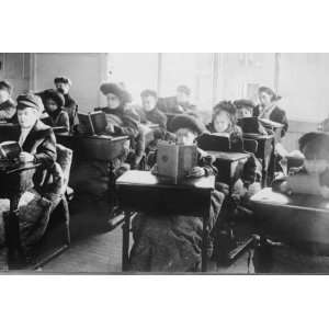 Children reading at desks in room of open air school, Providence 