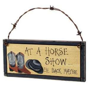  At a Horse Show sign