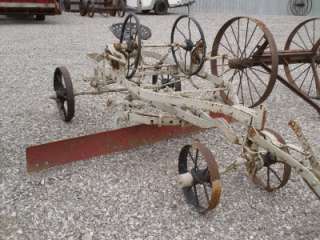 VERY UNUSUAL ANTIQUE ROAD GRADER THAT IS IN GOOD SHAPE.