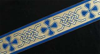cross and Celtic knot motif is jacquard woven in royal blue and 