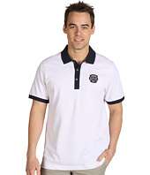 Lacoste S/S Solid Super Dry Polo w/ Badge and Contrast Collar $46.99 