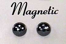   gauss magnet. Does not need pierced ears, uses magnets to clip on