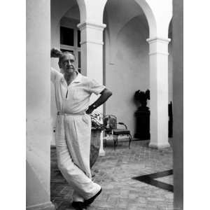 Author W. Somerset Maugham Standing on Front Porch, Looking Beyond 
