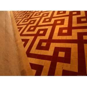  Close up of a Red and White Tile Floor with a Busy Pattern 