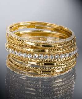 Amrita Singh set of 11   gold brass and crystal multiple bangles 
